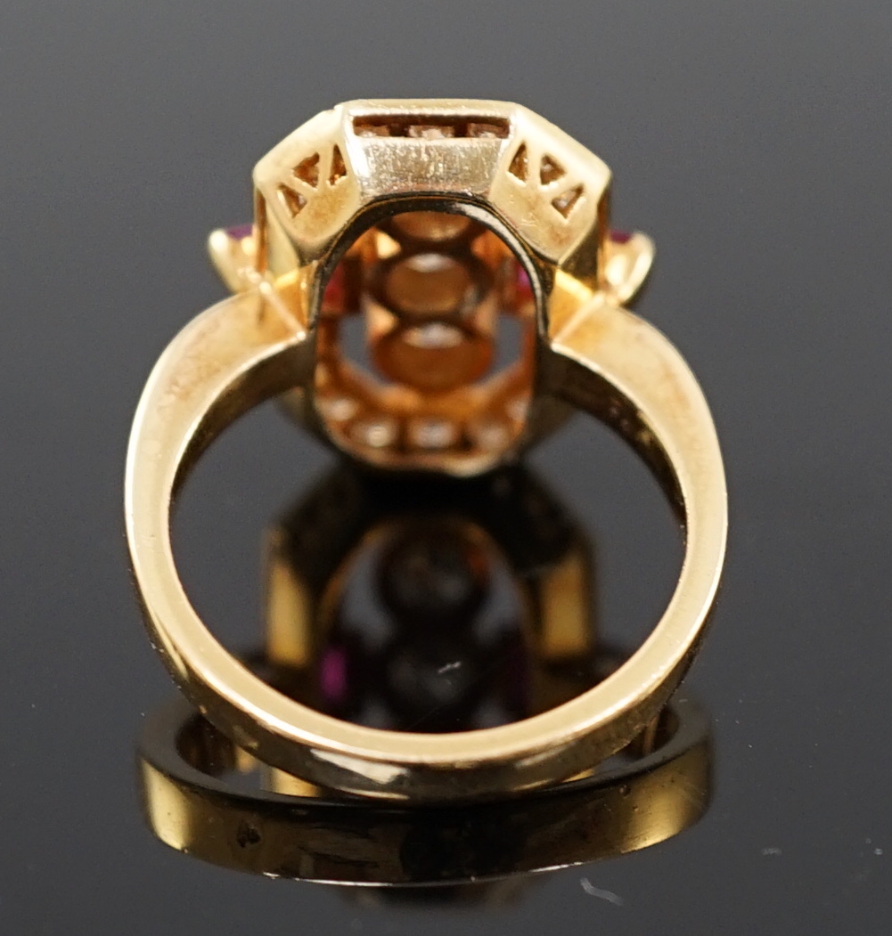 A modern gold, ruby and diamond cluster dress ring